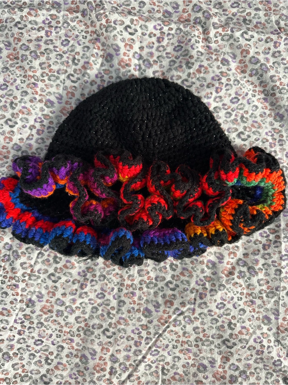 Handmade Black Crochet Bucket Hat with Colorful Ruffle Trim (for luscious hair).